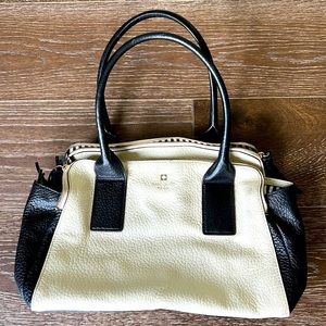 Kate Spade black & white purse. Tassels & zippers. Multiple pockets.